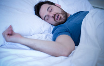 Man Snoring While Sleeping