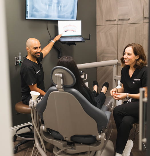Dr. Benjamin Yagoubian and Dr. Laila with patient
